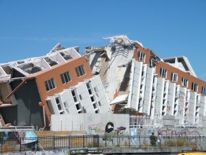 This photo shows a house which has collapsed right through the middle